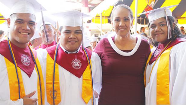 Some of the graduates’ favorite teacher and counselor, Mrs. Aiono, with the Class of 2017 the Valedictorians, yesterday morning.  [photo: EM]