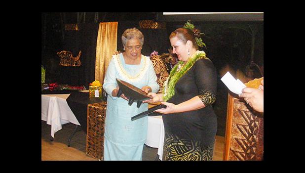 First lady Cynthia Malala Moliga (left) during the gift and award presentation to the 2017 Territorial Teacher of the Year, Dana Love-Ili, at the TTOY celebration sponsored by the Dept. of Education at the Tradewinds Hotel Pavilion last Friday evening.  [photo: FS]