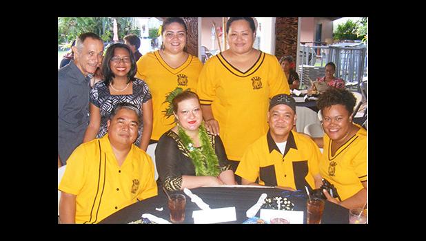 2017 Territorial Teacher of the Year, Dana Love-Ili (2nd from left siting), with her colleagues and friends from Nu’uuli Vocational Technical High School, at last Friday evening’s TTOY celebration at the Tradewinds Hotel Pavilion.  [photo: FS]