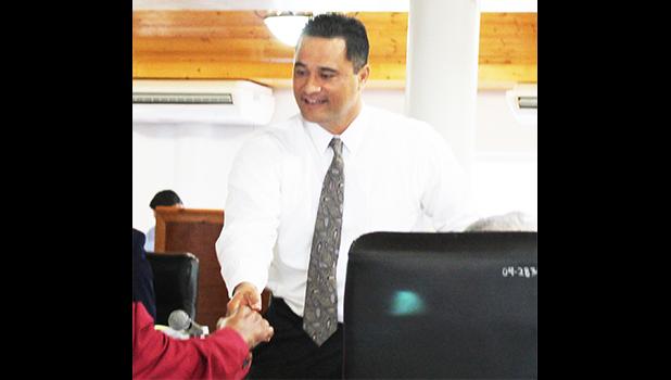 Attorney General Talauega Eleasalo Ale shaking hands with senators earlier this week. The AG has clarified that the Immigration Office no longer has the authority to issue entry permits for any foreigners, even citizens of Samoa. See story for details.  [photo: FS]