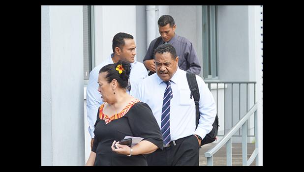 Deputy Attorney General Mitzie Jessop-Ta’ase (front) with the three senior police officials from Tonga coming out of the District Court building following a hearing yesterday morning for US citizen, Dean Fletcher, who is wanted in Tonga for the alleged murder of his wife. The officials are here to escort Fletcher back to Tonga to stand trial, however the District Court has not accepted the plea agreement between the fugitive and the government.  [Photo: AF]