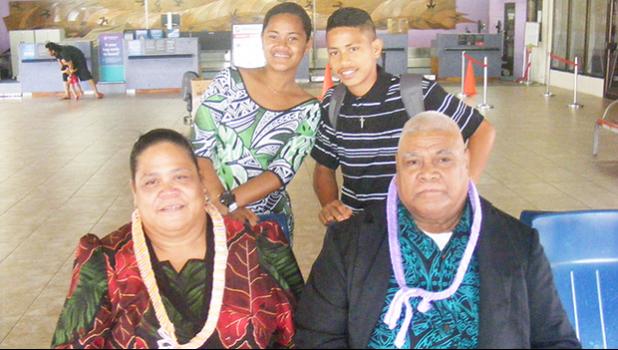 Rev. Steven Uitalia (left) along with his wife and their two grand children (pictured in the back), at the Pago Pago International Airport on Sunday morning were among the first nine-passengers on Talofa Airways’ ingural flight from American Samoa to Nuku’alofa, Tonga on Sunday, July 2.  [photo: FS]