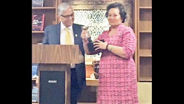 Dr. Underwood presents Congresswoman Amata with the 2017 Distinguished Alumnus Award. [courtesy photo]