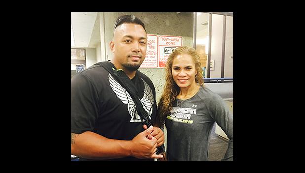 Coach Shane Lyman of Hawaii Elite Athletic Training/ Mana Barbell Gym stands here with Ursula Te'o Martin of American Samoa. Ms. Te’o Martin will be representing the territory in Tahiti this week at the 2016 South Pacific Bodybuilding Championships and Figure Competition.  Seen here, they are Tahiti-bound, ready to board the flight in Honolulu.  [courtesy photo]