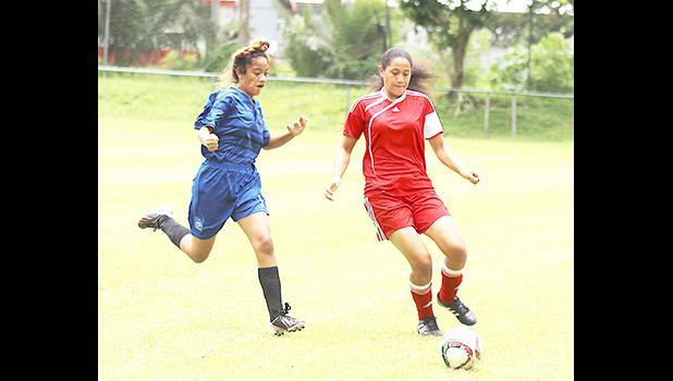 A Vaiala Tongan defender in action against a Green Bay opponent during the women’s FFAS National Cup challenge game at Pago Park Soccer Stadium on Saturday, October 28, 2017.  [FFAS MEDIA/Brian Vitolio]