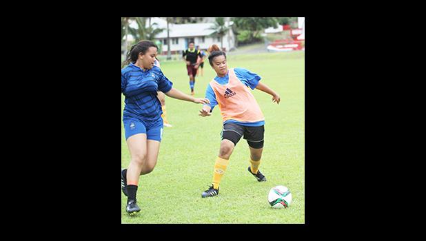 Women’s soccer action between a Green Bay (left) and Royal Puma opponents on Match Day 5 of the 2016 FFAS National League on Saturday, Sept. 17, at Pago Park Soccer Stadium.  [FFAS MEDIA/Brian Vitolio] 