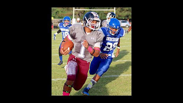 Panapa Filoiali’i of the Warriors out to the sidelines and turning this one in for six points for Tafuna in the second half of their Junior Varsity match up last Friday evening – opening game of last weekend’s ASHSAA Football week 7. Tafuna defeated Samoana 22 - 24. Panapa Filoiali’i of the Warriors out to the sidelines and turning this one in for six points for Tafuna in the second half of their Junior Varsity match up last Friday evening – opening game of last weekend’s ASHSAA Football week 7. Tafuna defeated Samoana 22 - 24.