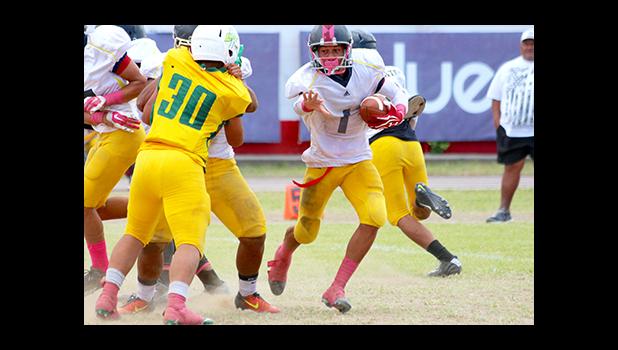 Samoa News selected the sophomore running back from Nu’uuli Vocational Technical High School – Wildcats Football Team: Iosefa Mauga (#1), as the Player of the Game in his marvelous performance against Leone. Mauga racked up 3 touchdowns, rushed for almost 200 yards.  [photo: TG]