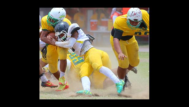 Jefferey Tago – Mike Linebacker for the Wildcats laying a solid hit on Leone’s ball carrier in the second half of their JV action last Saturday morning. Leone suffered a six-point loss against the Nu’uuli Wildcats 36 - 30. [photo: TG]