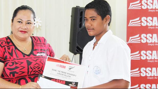Samoa Stationery and Books owner and Chief Executive Officer Fiti Leung Wai during SSAB’s Ambassador Scholarship program that is part of their annual Back to School Campaign two weeks ago. She’s pictured here during the ceremony held at their SSAB conference room in Apia with one of the scholarship recipients.  [Courtesy Photo]
