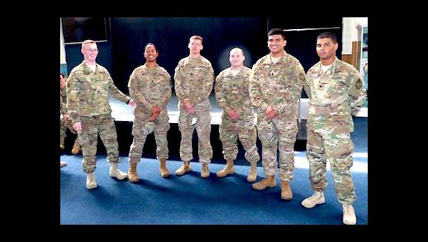 Mai le kamupani atoa e 27 na malaga, e i ai ona soa kamupani ma o le vaega lea a le Ordinance e alai ai le fitafita tiute mai Amerika Samoa, SPC Uluenga, Faaati Lehualani. L-R: Randy Gillis [E le’i alu i le vaega mo Europa], SPC Uluenga, Faaati Lehualani; SPC Lambert, Tyler; SGT Vazquez, Hector; PFC Espinoza, Esteban ma SPC Quiles, Fernando.  [ata: Leua Aiono Frost]