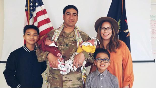 courtesy photo Infantry Drill Sergeant Mumaina Lagai with his wife and children
