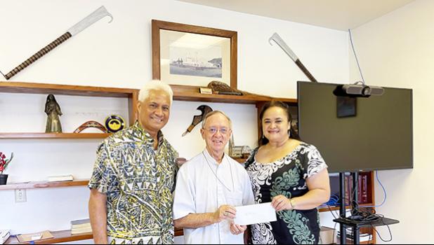  Larry S. Sanitoa , Bishop Peter Brown, Olivia C. Reid