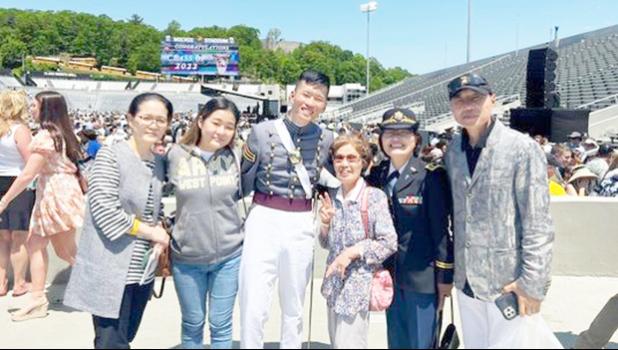 West Point graduate Seung Ju Bryan Myung is pictured here with his family shortly after the ceremony at the U.S. Military Academy. L to R: Hye Ryeon Koun (mother), Diana Myung (sister) Graduate Cadet Seung Ju Myung, Major Han, Jae Uhng Myung (father). Graduate Cadet Seung Ju Myung with his family and supporters