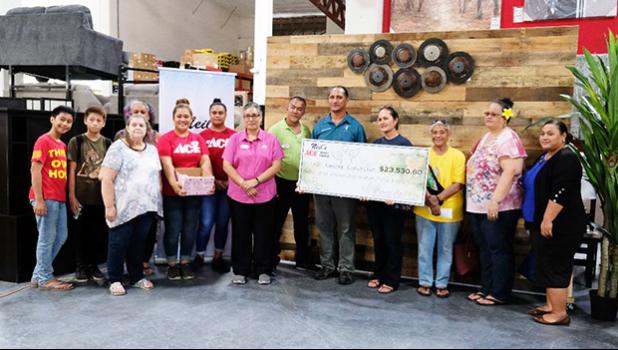 Pictured is the staff of Neil’s ACE Home Center, ASCCC members, cancer patients and their family members. 