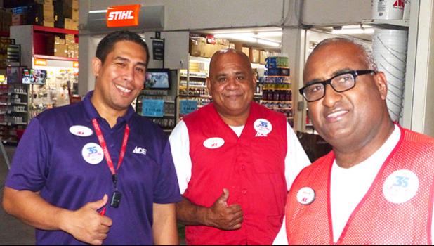 3 Neil’s Ace Home Center employees giving customers a 'thumbs up'