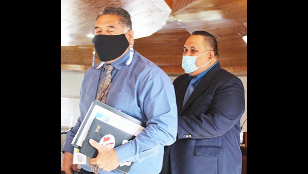  Christopher King (front) and Attorney General Fainu’ulelei Falefatu Alailima-Utu