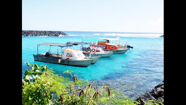Three alia boats tethered to shore