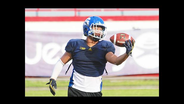 All-Star Linebacker, (SHS) Cornelius Aiava making a one handed catch – interception/swat drill during practice this past Tuesday morning at the Veterans Memorial Stadium.  [photo: TG]