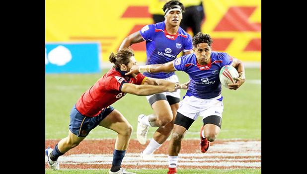 Samoa’s Elisapeta Alofipo makes a break against Spain
