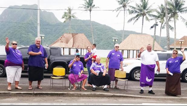 Lt. Governor Lemanu Peleti Palepoi Sialega Mauga (2nd from right) and Port Administration director Taimalelagi Dr. Claire Poumele (far right), along with officials and employees of various government departments and agencies.  Seated (right) is HC Afoa Moega Lutu, whose children and family members are among those spearheading efforts to bring awareness to Alzheimers. 