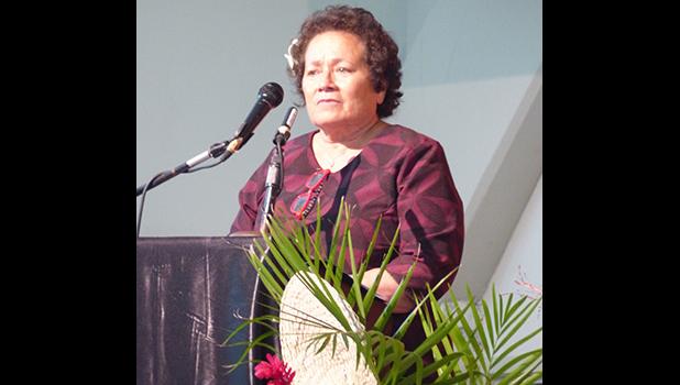 Congresswoman Aumua Amata speaking Wednesday night during a family service for the late ASPA executive director Utu Abe Malae