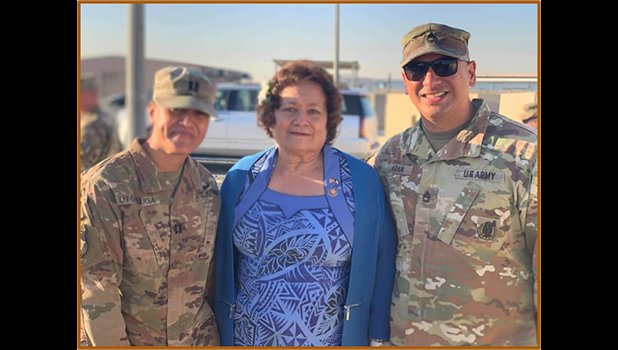Amata with two American Samoa soldiers in the Middle East