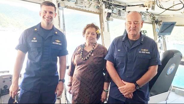 Amata with Admiral Michael Day and Lt. Commander Timothy Bonner.