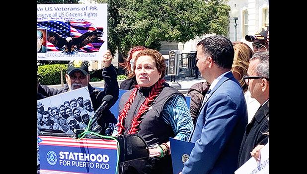 Amata speaking at Veterans event