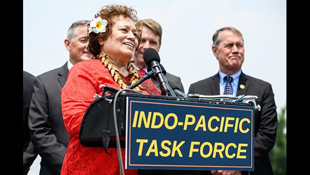 Amata speaking at press conference  