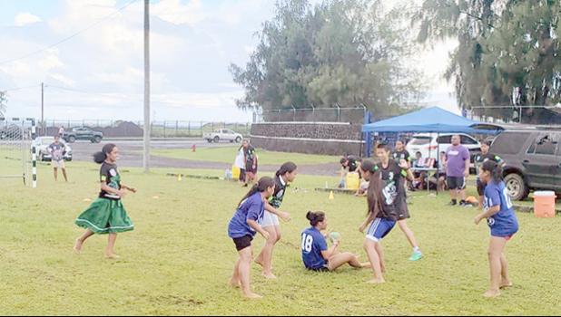 Amelie Chen of The Wolves fights for a loose ball