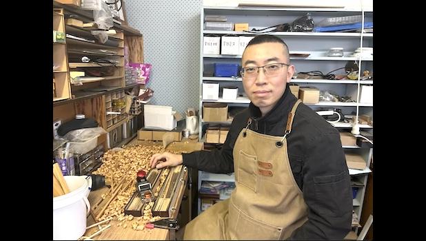 Andrick Li makes chopsticks