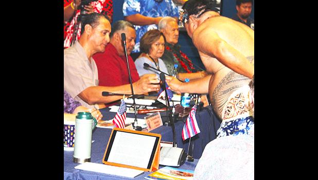 Western Pacific Regional Fishery Management Council, Taotasi Archie Soliai (left) accepting his ‘ava cup, In the background (L-R) are: Lt. Governor Lemanu Peleti Mauga, Council executive director Seuta’atia Kitty M. Simonds, and Secretary of Samoan Affairs, Mauga Tasi Asuega.