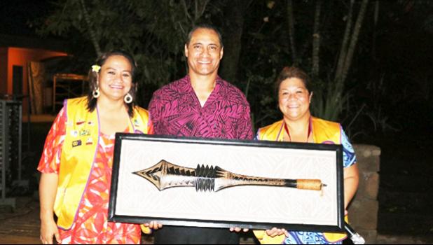 Archie Soliai, Former President of the Lions Club of Pago Pago receives his award from current president, Ms Tafaimamao Tua-Tupuola. 