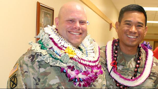 Lt. Col. Clinton Seybold (left) and  Lt. Col. Alejandro L. Buniag Jr.