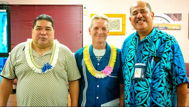 ASCC-ACNR Director Aufa’i Apulu Ropeti Areta (right) gives his well-wishes to two retiring staff members, Network Specialist Albert Siliga (left) and Health Communications Researcher Micah van der Ryn