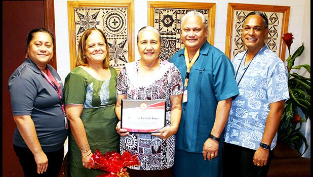 Mrs. Elisapeta Faalafi-Jones (center), along with ASCC administrators