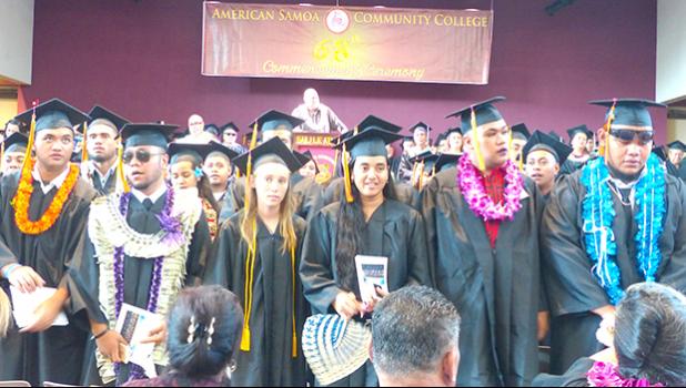  Some of the 132 graduates of the American Samoa Community College’s Spring 2018 Commencement  Ceremony held last Friday morning when Commencement speaker, Lt. Gov. Lemanu Sialega Palepoi Mauga (on stage) called on them to turn towards their parents, family members and others in the audience - to thank them for their support. [photo: Leua Aiono Frost]