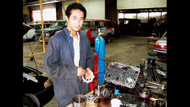 Young man in ASCC-TTD auto mechanic garage