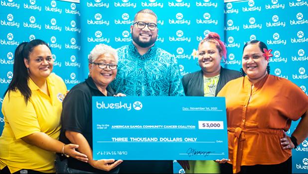 Justin Tuiasosopo (center) with Bluesky staff