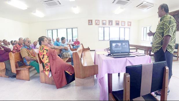 Pulenuu watching presentation