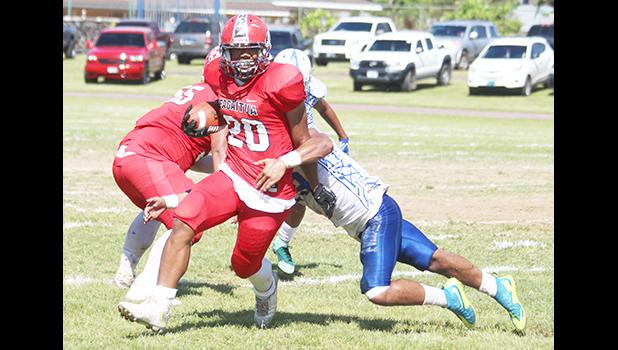 Advent Migi of the Vikings carrying this one for huge yardage for the Big Red Machine during the second quarter of their playoff game against the Sharks. photo: TG]