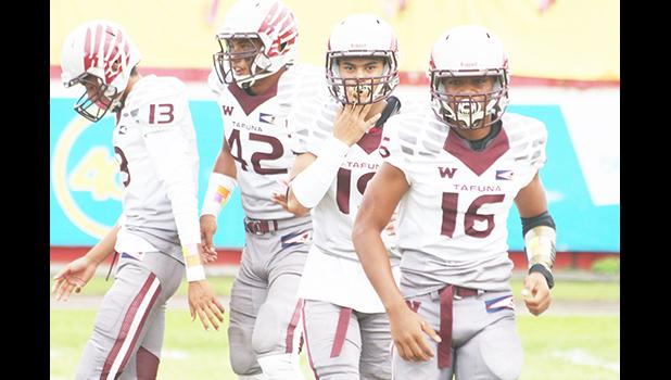 Tafuna Warriors' special teams breaking out of the huddle and setting up for the opening kick off to the Sharks, during this year's ASHSAA varsity football championship game where the Sharks edged the Warriors 7-6 to claim the title. [photo: TG]