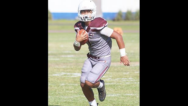 The Samurai, Koison Ozu returning a punt for the Warriors in the second half of their match up against the Vikings last Saturday, during the opening game of the 2017-2018 ASHSAA football season. Ozu led the Warriors to their first victory 24-14. [photo: TG]