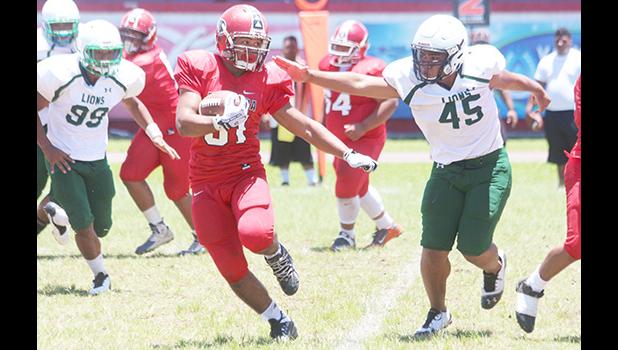 Ball carrier for the Vikings moving the chains downfield during a Junior Varsity game against the Lions last Saturday morning, where the Lions won 26-14. [photo: TG]