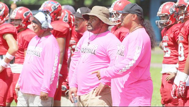 Yes, it’s Pinktober every Saturday at the Veterans Memorial Stadium, as coaches and players come out with their pink uniforms in honor of Breast Cancer Awareness Month. Pictured is the Faga’itua Vikings coaching staff with their pinktober uniforms. [photo: TG]