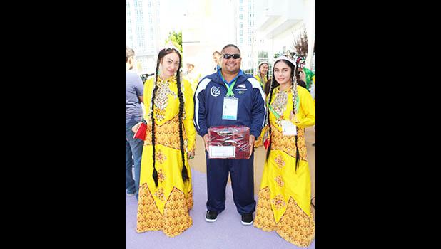 American Samoa Wrestler Zena Iese with two Turkmenistan Dancers after welcoming ceremony. (Photo:ASNOC\TCA) American Samoa Wrestler Zena Iese with two Turkmenistan Dancers after welcoming ceremony. (Photo:ASNOC\TCA)
