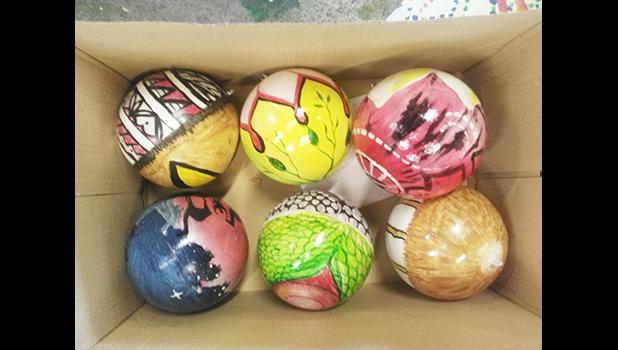 Six of the 26 ornaments painted by Leone HS art students this