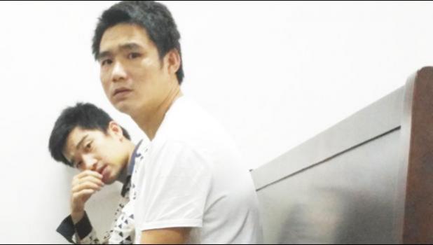 Charged with theft: Yang Quigreen and Zhong Shuiming. [Samoa Observer]