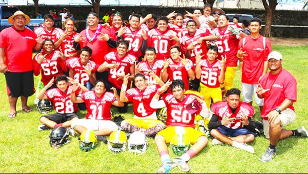 The AYFS Red All Star Team led by Head Coach Kirifi Ofagalilo (bottom right) posing for a team photo after defeating the AYFS Blue All Star team in a stunning 14-8 comeback victory last Saturday at the Veterans Memorial Stadium. (See tomorrow's Samoa News issue for the Red and Blue All-Star Game story and more photos) [photo: TG]